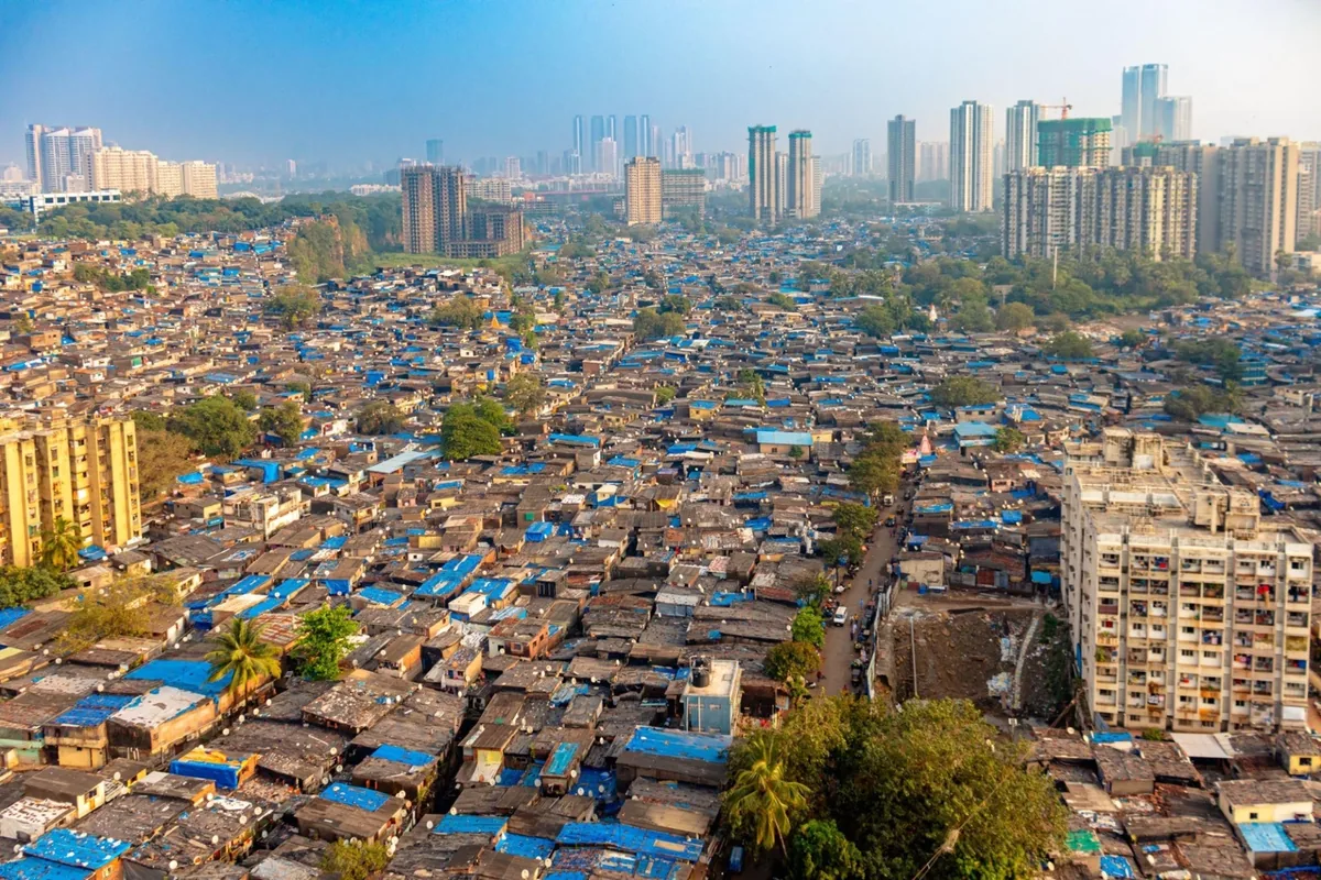 Standing Between Growth and Gaps dharavi 1200